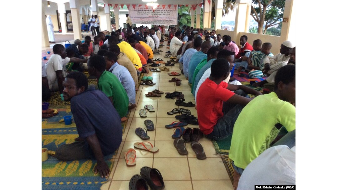 Christians breaking the fast wtih Muslims at a mosque in Yaounde.