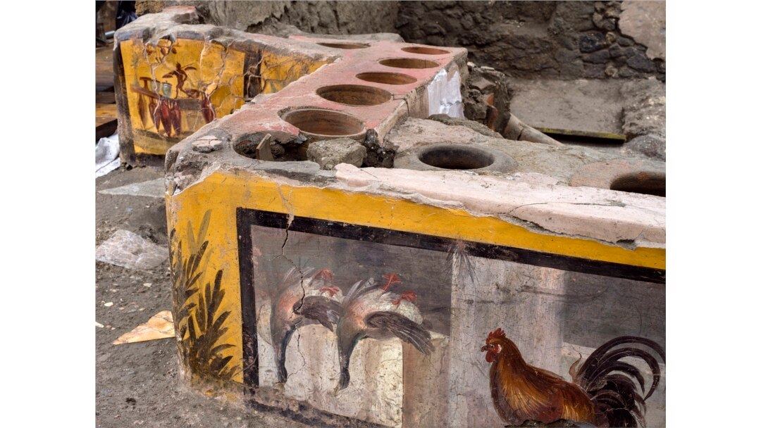 This image provided by the Pompeii Archeological park press office shows the thermopolium in the Pompeii archeological park, near Naples, Italy. @Luigi Spina (Courtesy)