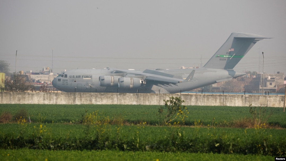 A U.S. military plane deporting Indian immigrants lands in Amritsar, India Feb. 5, 2025. 