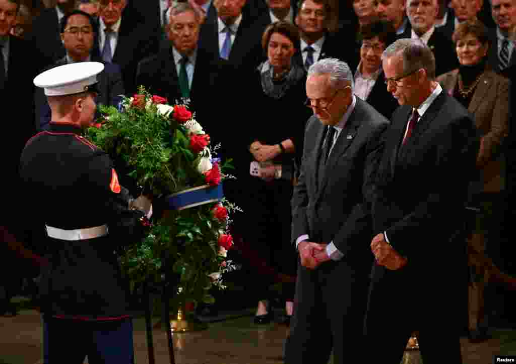 Senate Democratic leader Chuck Schumer presents a wreath during a ceremony in the Rotunda of the U.S. Capitol in Washington, on Jan. 7, 2025.