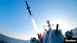 A North Korean People’s Army naval unit tests a new type of anti-ship cruise missile in this undated photo released by the Korean Central News Agency in Pyongyang, Feb. 7, 2015.