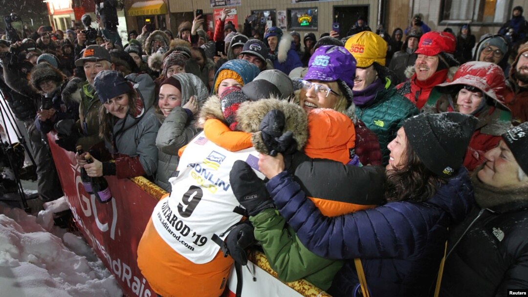 Pete Kaiser of of Bethel, Alaska embraces fans from his hometown after winning the Iditarod Trail Sled Dog Race after crossing the finish line in Nome, Alaska, U.S. March 13, 2019. (REUTERS/Diana Haecker/Nome Nugget)