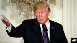 President Donald Trump speaks during a news conference with Baltic leaders in the East Room of the White House, April 3, 2018, in Washington.
