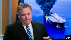 FILE - Secretary of State Mike Pompeo closes his remarks as he departs after a media availability, at the State Department, June 13, 2019.