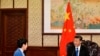 In this photo provided by Hong Kong Government Information ServicesChinese President Xi Jinping, right, speaks with Hong Kong Chief Executive Carrie Lam, during their meeting, in Beijing, China, Dec. 16, 2019.