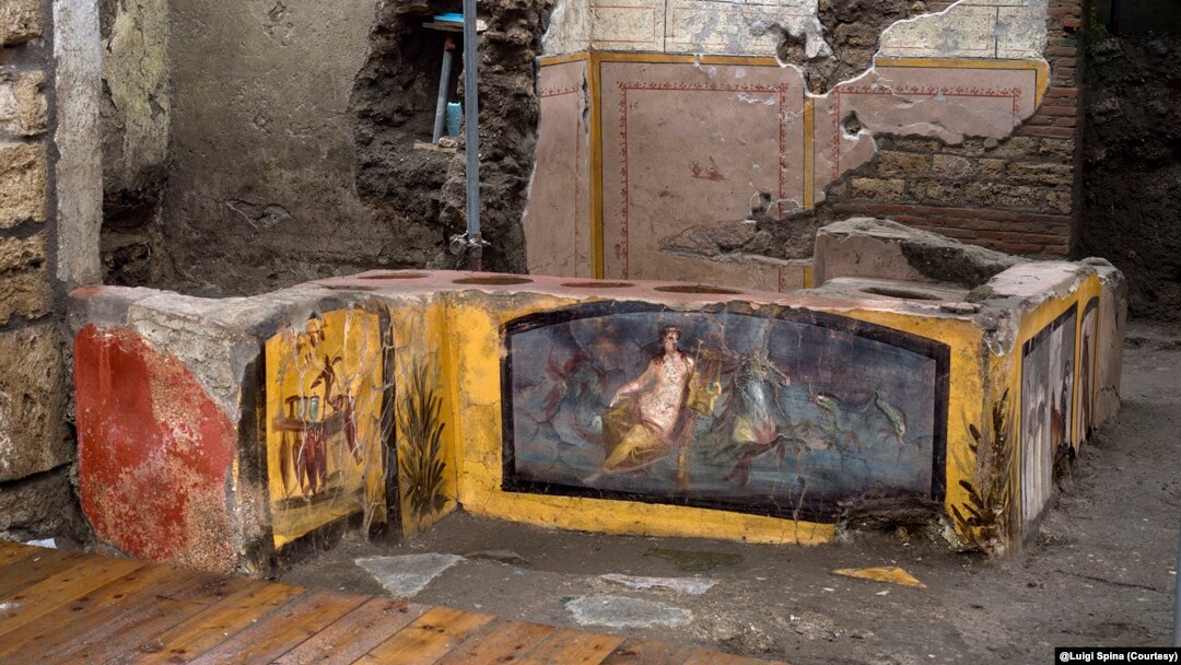 This image provided by the Pompeii Archeological park press office shows the thermopolium in the Pompeii archeological park, near Naples, Italy. @Luigi Spina (Courtesy)