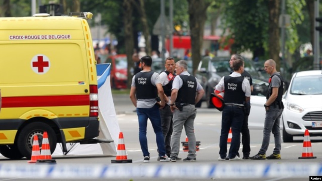 Policías aseguran la escena del atentado en Lieja, Bélgica el 29 de mayo de 2018.
