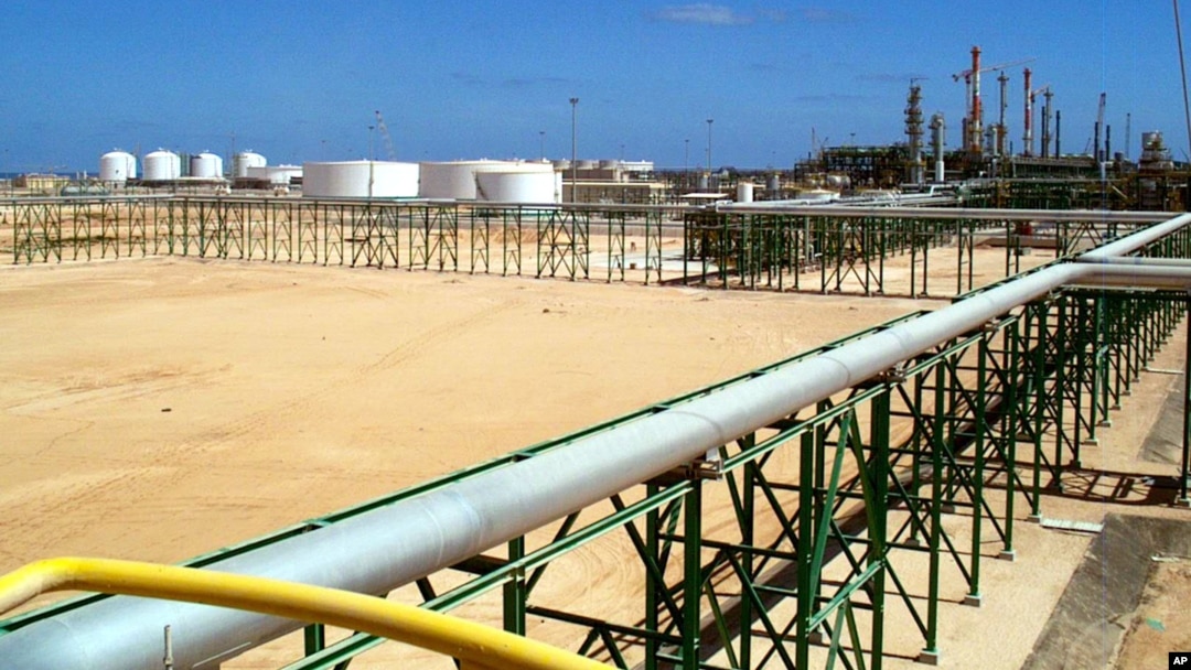 FILE - Eni [Italian oil and gas company] gas compression plant is seen on the shore of Mellitah, Libya.