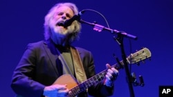 FILE - In this April 23, 2014 file photo, musician Bob Weir performs at the premiere of "The Other One: The Long, Strange Trip of Bob Weir" during the 2014 Tribeca Film Festival in New York.