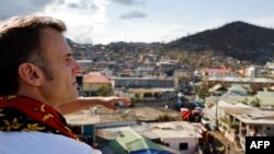 FILE - French President Emmanuel Macron visits the Kavani district in Mamoudzou on the French Indian Ocean territory of Mayotte on Dec. 19, 2024, following Cyclone Chido's passage over the archipelago.