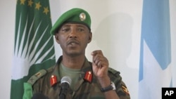 Current African Union Mission in Somalia (AMISOM) Force Commander Major General Fred Mugisha, speaks to the Somali media at the mission's headquarters in the capital Mogadishu in this handout photo taken April 26, 2012.