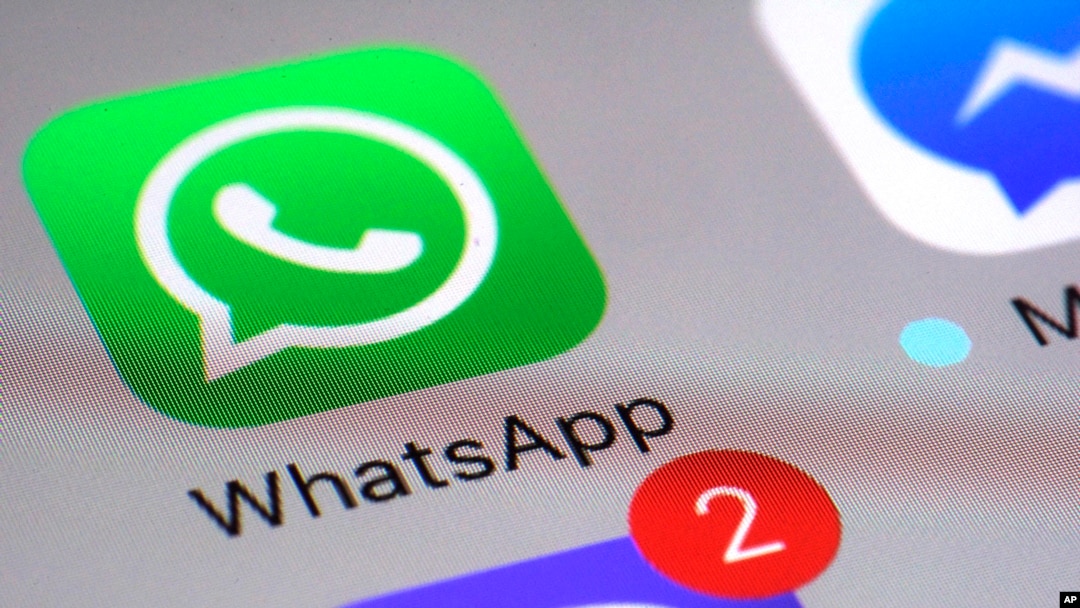 FILE - The WhatsApp icon is shown on a smartphone, March 10, 2017, in New York. 