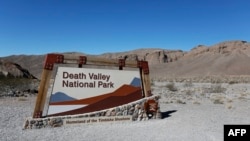 FILE - A view of the Death Valley National Park sign is seen in Death Valley, Calif., Feb. 14, 2017.