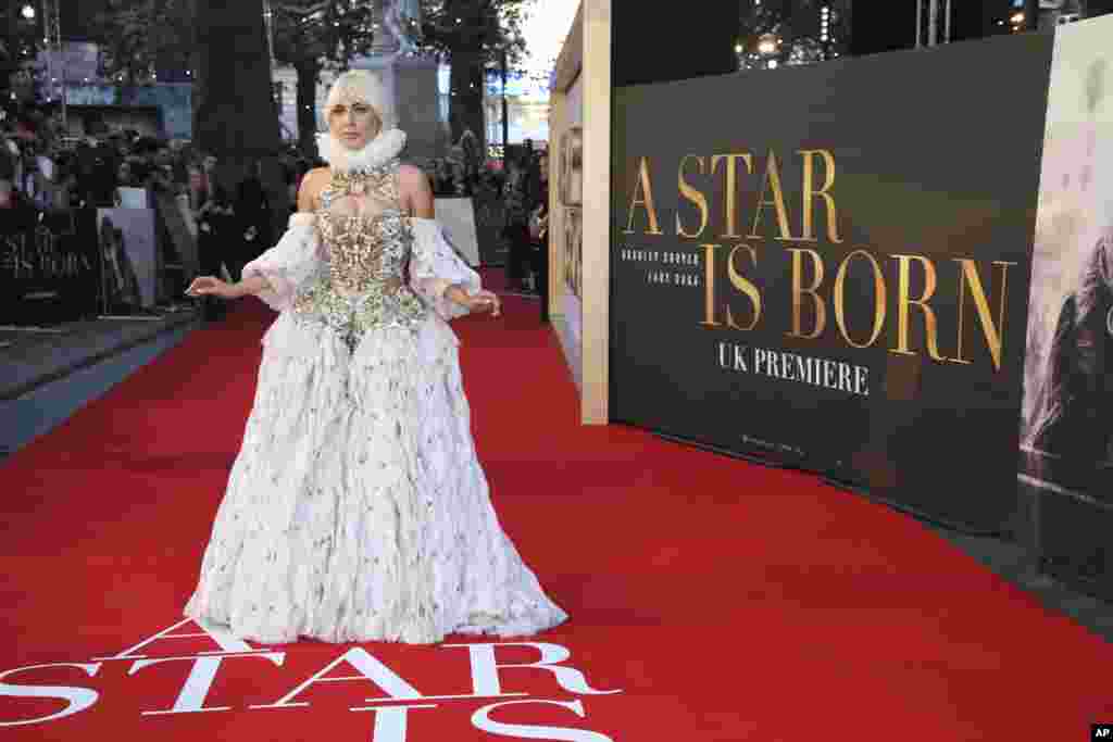 Actress and singer Lady Gaga poses for photographers upon arrival at the premiere of the film "A Star Is Born" in London.