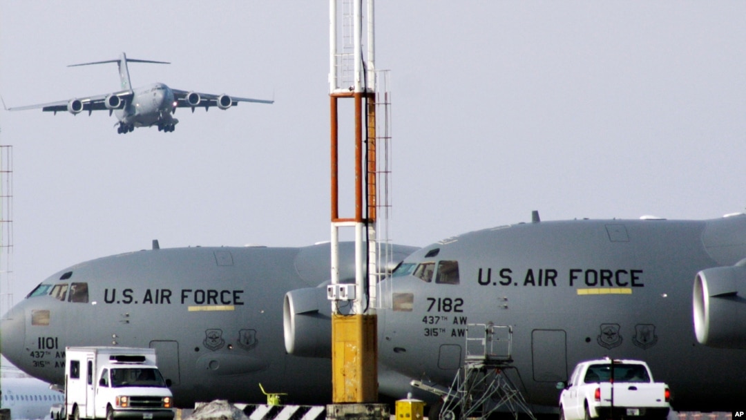 FILE - U.S. military planes are seen at Manas airbase outside Bishkek, Kyrgyzstan, Feb. 12, 2009.