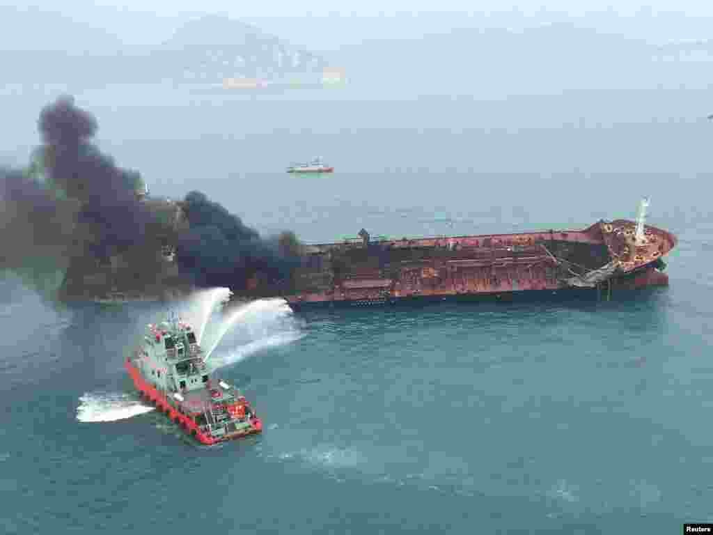 An oil tanker is on fire near Lamma island, Hong Kong, China. At least one person is dead and two are missing after an oil tanker caught fire near Lamma island.