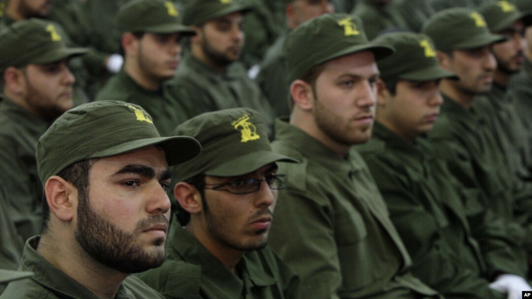 Milicianos de Hezbolá celebran el día del mártir en Beirut, Líbano.