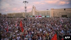 Opposition supporters protest against disputed presidential elections results at Independence Square in Minsk, Belarus, Aug. 18, 2020.