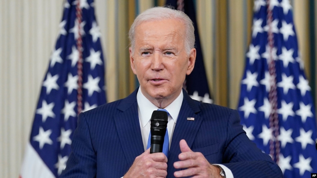 FILE - President Joe Biden answers questions from reporters as he speaks in the State Dining Room of the White House in Washington, Nov. 9, 2022.