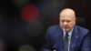 El fiscal de la Corte Penal Internacional, Karim Khan, saluda al presidente Nicolás Maduro en el Palacio de Miraflores, el 8 de junio.