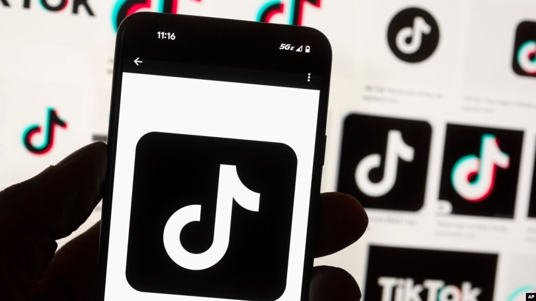 FILE - The TikTok logo is seen on a cell phone on Oct. 14, 2022, in Boston. 