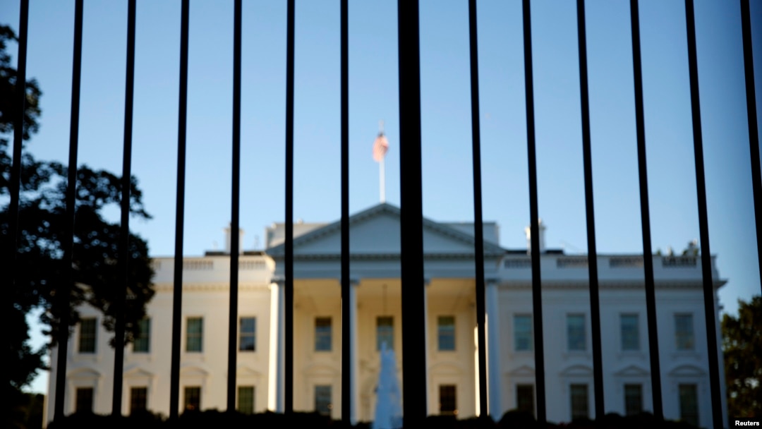 FILE - The White House is seen from outside the north lawn fence in Washington, D.C.
