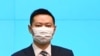 香港高官因與新冠初步確診者同場出席派對而被送往隔離