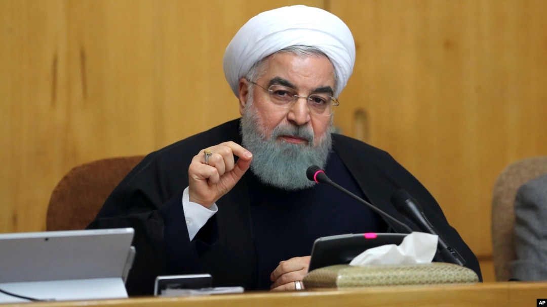 FILE - photo, released by official website of the office of the Iranian Presidency, President Hassan Rouhani speaks in a cabinet meeting in Tehran, Iran.