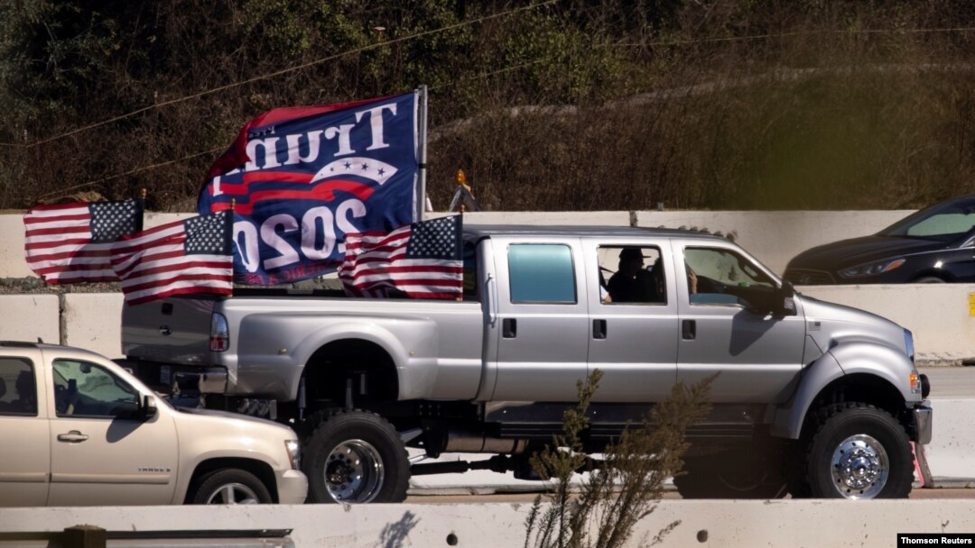 Trump vehicle caravan travels down highway in California, Nov. 2, 2020.