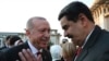 FILE - Turkey's President Recep Tayyip Erdogan (L) talks to Venezuela's President Nicolas Maduro (R) prior to a dinner following a ceremony at the Presidential Palace in Ankara, Turkey, July 9, 2018.