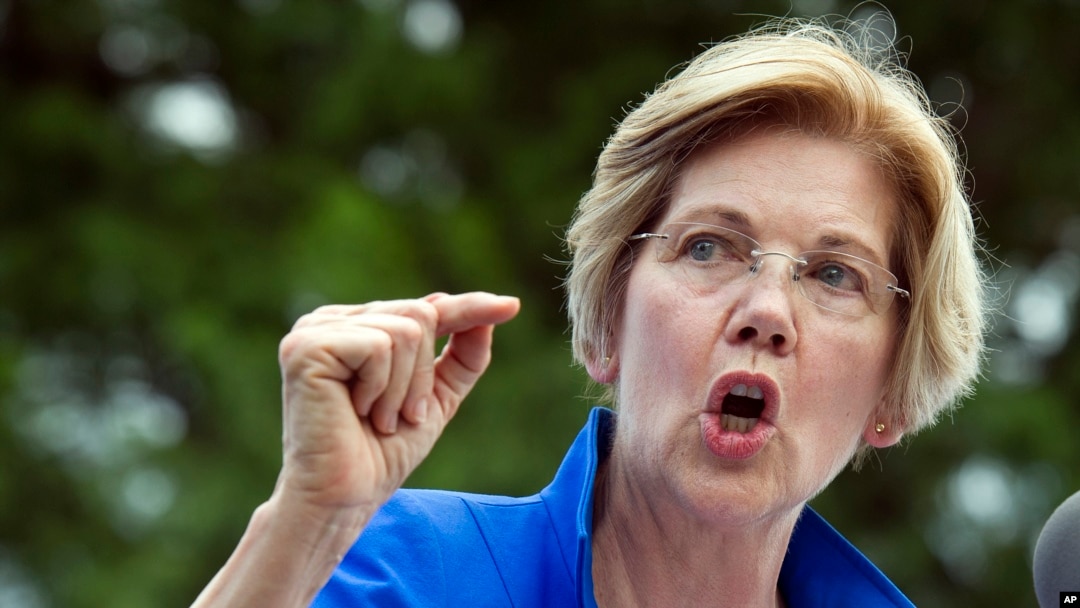 Sen. Elizabeth Warren, D-Mass., speaks in a park in Berryville, Va., where Congressional Democrats unveiled their new agenda, July 24, 2017. Warren is working to defuse an issue that has dogged her for years, her claims of Native American heritage, ahead 