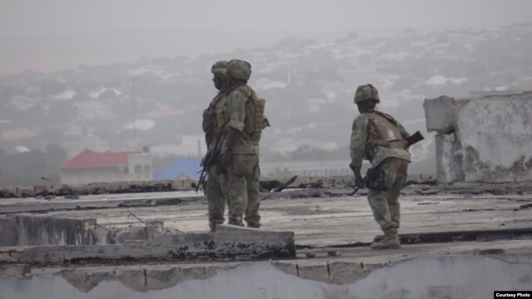 Gaashaan soldiers shortly after re-taking control of the Somali parliament building from al-Shabab fighters in on May 24, 2014. (Somalia Handout Photo)