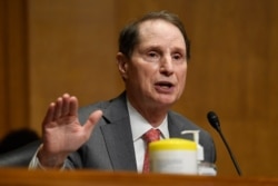 FILE - Sen. Ron Wyden at a Senate Finance Committee hearing on Capitol Hill in Washington, June 30, 2020.