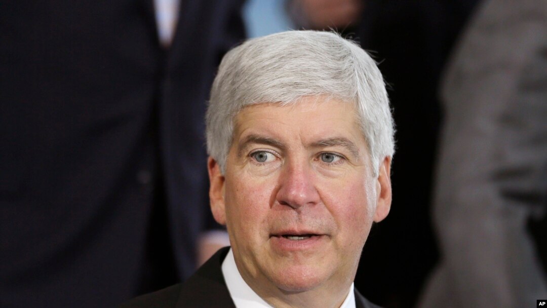 FILE - Michigan Gov. Rick Snyder speaks in Detroit. Snyder is under fire, accused of reacting too slowly to the water crisis in Flint.