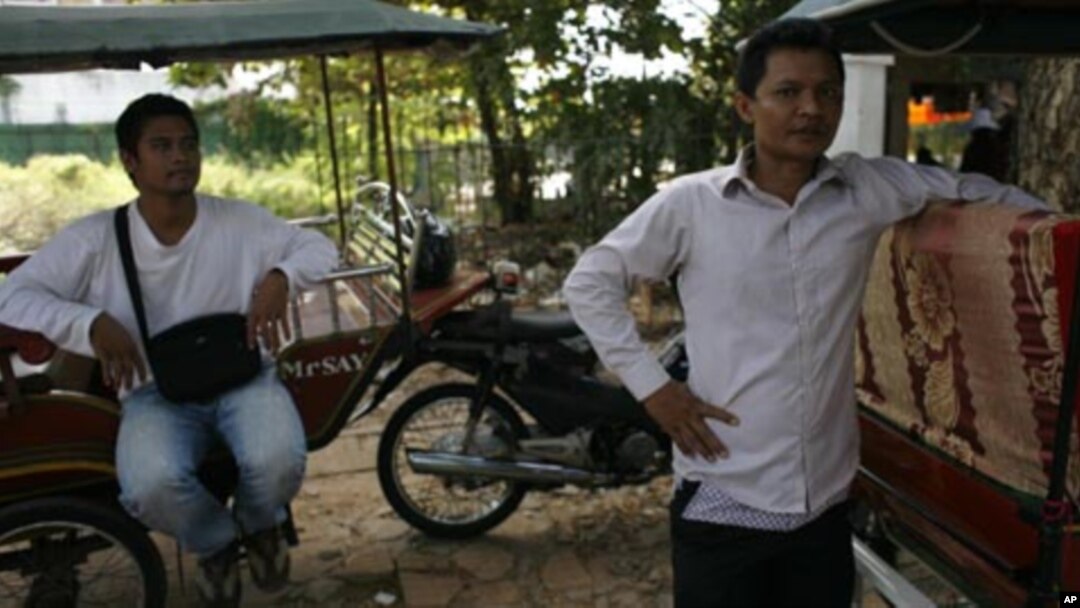 Cambodian tuk-tuk drivers in Siem Reap, like Chan and Sambath, are not being helped by the rise in Asian tourists.