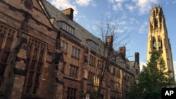 FILE - Harkness Tower on the campus of Yale University in New Haven, Conn., Sept. 9, 2016.