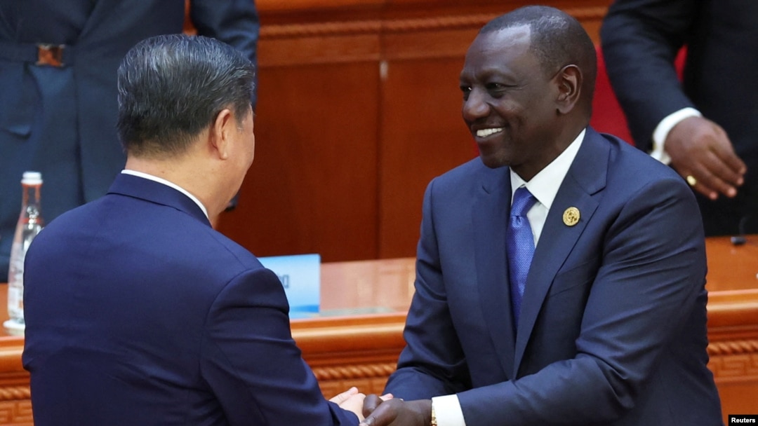 Chinese President Xi Jinping and Kenyan President William Ruto greet each other at the opening ceremony of the ninth Forum on China-Africa Cooperation Summit at the Great Hall of the People in Beijing on Sept. 5, 2024.