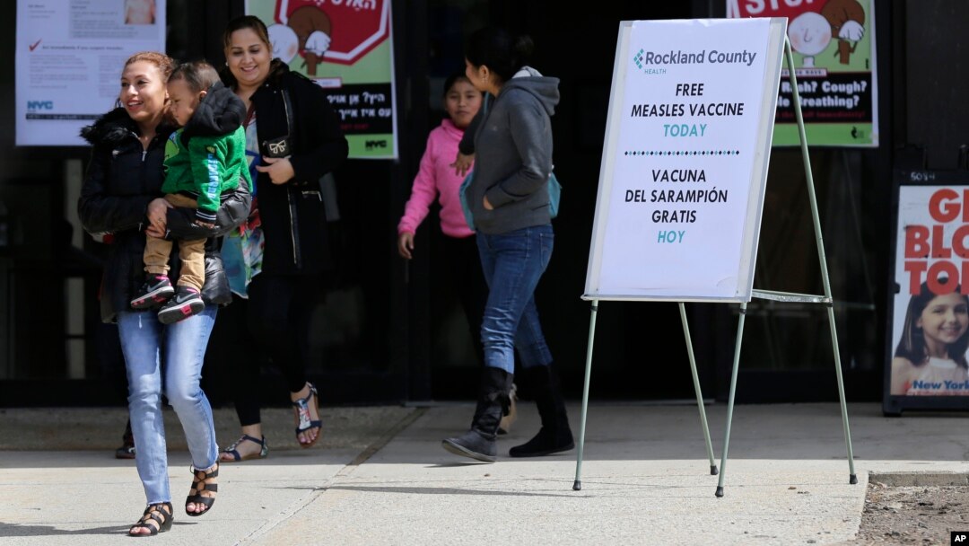 Signs advertising free measles vaccines and information about measles are displayed at the Rockland County Health Department in Pomona, N.Y., March 27, 2019. The county declared a local state of emergency over a measles outbreak that has infected 150 people since last fall.