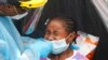 Dorah Cerisene, 9, gets tested for COVID-19, in North Miami, Fla., Aug. 31, 2021.