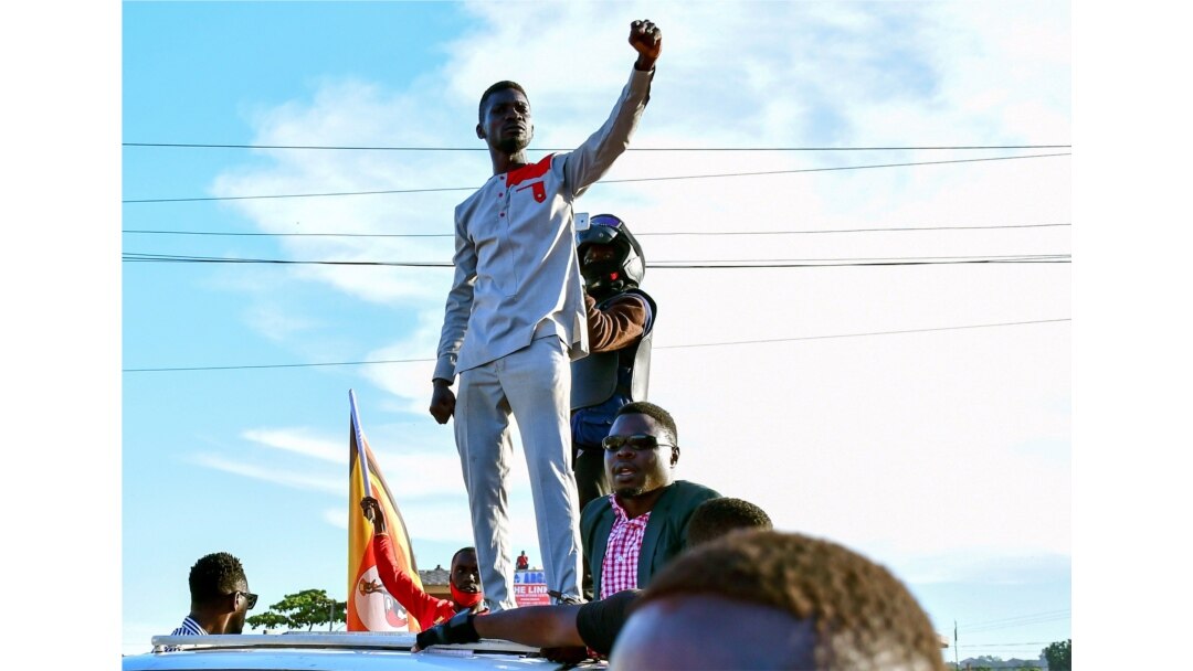 FILE - Ugandan pop star and presidential candidate Robert Kyagulanyi, also known as Bobi Wine, campaigns near Kampala, Uganda, Nov. 30, 2020.