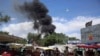 FILE - Smokes rises from a maternity hospital, after gunmen attacked in Kabul, Afghanistan, May 12, 2020. 