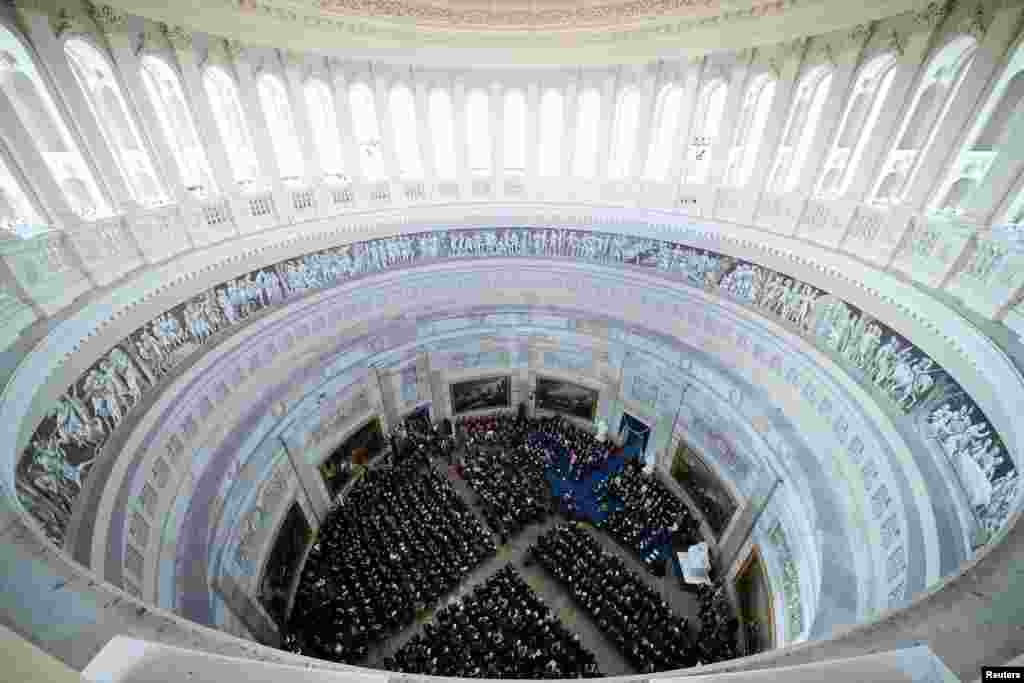 People attend the Inauguration of President-elect Donald Trump as the 47th president of the United States in the Rotunda at the U.S. Capitol on Jan. 20, 2025 in Washington.