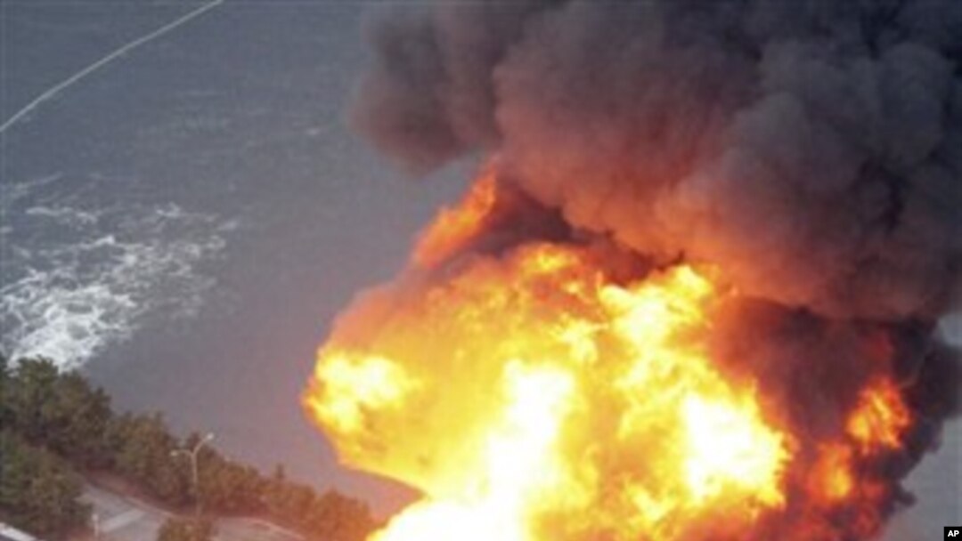 Oil refinery facility is on fire in Ichihara, Chiba Prefecture (near Tokyo) after strong earthquakes hit Japan, March 11, 2011