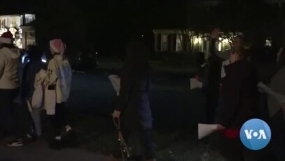 Neighbors Bond Over Fondness for Caroling