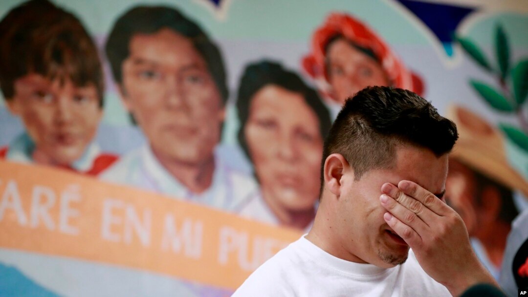 FILE - Christian, from Honduras, recounts his separation from his child at the border during a news conference at the Annunciation House,in El Paso, Texas, June 25, 2018. 