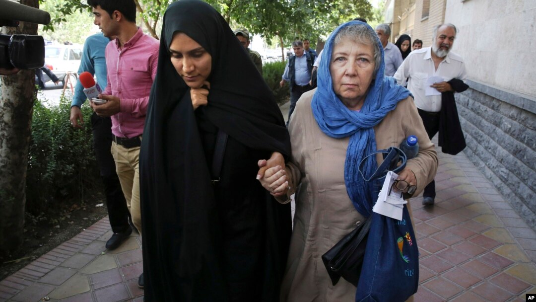 Mary Rezaian, mother of detained Washington Post correspondent Jason Rezaian, right, and Jason's wife Yeganeh leave court in Tehran, Iran, Aug. 10, 2015. Rezaian was one of four American detainees freed by Iran on Jan. 16, 2016.